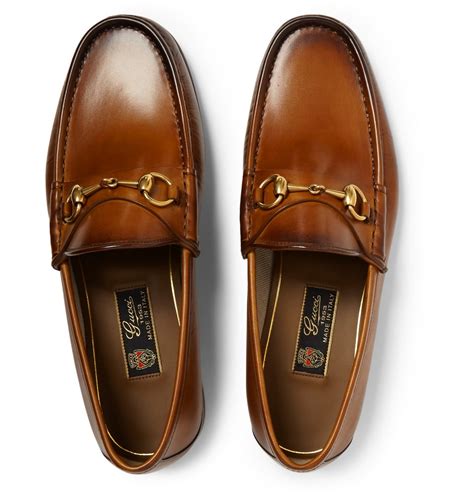 Men's loafer with Horsebit in brown leather 